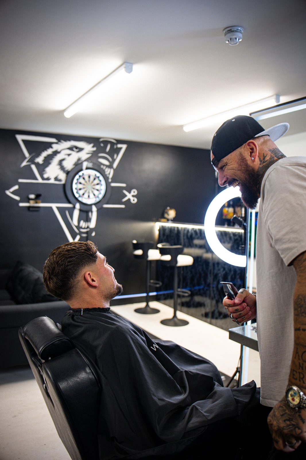 Barber and client catching up at Wolfgang Hair Leicester